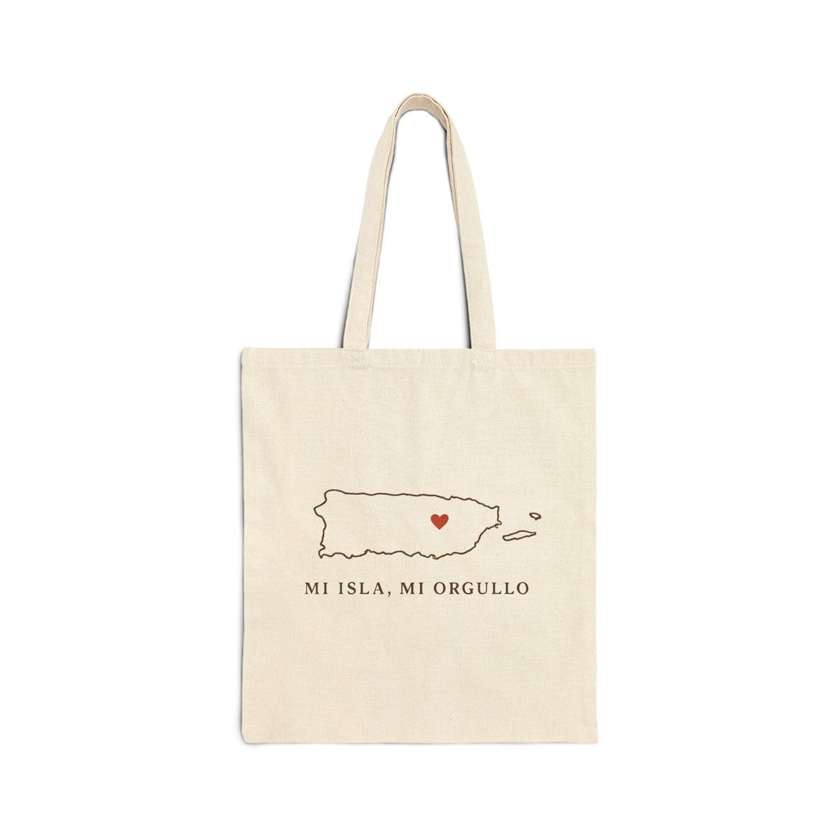 An off-white canvas tote bag with two shoulder straps, featuring a minimalist graphic of Puerto Rico with a small red heart and the Spanish text 'MI ISLA, MI ORGULLO' printed below it.